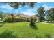 Charming single-story home with well-maintained landscaping, lush lawn and a two car garage at 2809 Gulf Winds Ct, Oviedo, FL 32765