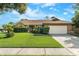 Charming single-story home with well-maintained landscaping, lush lawn and a two car garage at 2809 Gulf Winds Ct, Oviedo, FL 32765