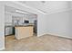 Bright kitchen featuring an island and stainless appliances at 2930 Candela Ct, Apopka, FL 32703