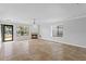 Spacious living room with neutral walls, tile floors, and natural light at 2930 Candela Ct, Apopka, FL 32703