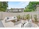 Back patio with furniture and views of the townhome complex at 2930 Candela Ct, Apopka, FL 32703
