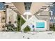 Aerial view showcasing the beachfront property, landscaped grounds, and outdoor pool at 3023 S Atlantic Ave # 2050, Daytona Beach, FL 32118