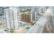 Panoramic aerial view of beachfront property with community pool, convenient parking, and ocean access at 3023 S Atlantic Ave # 2050, Daytona Beach, FL 32118