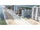 An aerial view of a beachside condo building, showcasing its proximity to the ocean at 3023 S Atlantic Ave # 2050, Daytona Beach, FL 32118