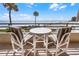 Relaxing balcony with seating overlooking the beach, ocean and community pool at 3023 S Atlantic Ave # 2050, Daytona Beach, FL 32118