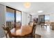 Dining room with access to a balcony, providing a view of the ocean and nearby condos at 3023 S Atlantic Ave # 2050, Daytona Beach, FL 32118