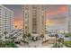 A high-rise condo on the beach with sunset skies, offering ocean views and parking at 3023 S Atlantic Ave # 2050, Daytona Beach, FL 32118