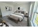 Bedroom with a bed, decor, and lots of natural light from the window at 3159 Sw 127Th Lane Rd, Ocala, FL 34473