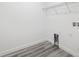 The laundry room includes modern flooring and hookups for a washer and dryer at 3159 Sw 127Th Lane Rd, Ocala, FL 34473