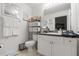 Cozy bathroom offers ample storage space, toilet and sink at 3404 Village Green Ct, St Cloud, FL 34772