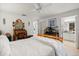 Spacious main bedroom features a cozy desk area and an en-suite bathroom for added convenience at 3404 Village Green Ct, St Cloud, FL 34772