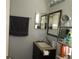 Standard bathroom features a vanity with sink and a mirror at 362 White Marsh Cir, Orlando, FL 32824