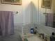 Marble-look tile in the bathroom, featuring neutral walls and simple fixtures at 362 White Marsh Cir, Orlando, FL 32824