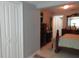A bedroom view shows a closet door, and dark wood furniture at 362 White Marsh Cir, Orlando, FL 32824