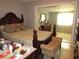 Comfortable bedroom featuring a dark wood bed frame and neutral toned walls at 362 White Marsh Cir, Orlando, FL 32824