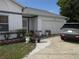 Charming one-story home with a well-manicured lawn and a two-car garage at 362 White Marsh Cir, Orlando, FL 32824