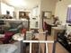 Comfortable living room transitioning into the kitchen and office area at 362 White Marsh Cir, Orlando, FL 32824