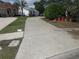 View of long driveway across the street at 362 White Marsh Cir, Orlando, FL 32824