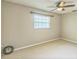 Bedroom with a ceiling fan, neutral walls, two windows, and carpeting at 403 Broadview Ave, Altamonte Springs, FL 32701
