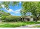 Well-maintained home featuring a landscaped front yard and attached two car garage at 403 Broadview Ave, Altamonte Springs, FL 32701