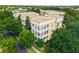 Scenic aerial view of the property showcasing its manicured landscaping and charming balconies at 4385 Wardell Pl # 13, Orlando, FL 32814