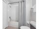 Standard bathroom featuring a white shower-tub combination, providing essential functionality at 4385 Wardell Pl # 13, Orlando, FL 32814