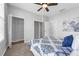 Bedroom with closet featuring adjustable shelving and ample storage space at 4385 Wardell Pl # 13, Orlando, FL 32814