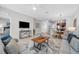 Open concept floor plan features comfortable living room, dining area, and modern kitchen at 4385 Wardell Pl # 13, Orlando, FL 32814
