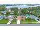 Aerial view showcasing the home's location in a lakeside community with private pools at 4390 Carolwood St, Orlando, FL 32812