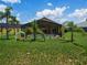 Enjoy the beautiful backyard with a screened-in pool and patio, perfect for outdoor fun at 456 Old Bridge Cir, Davenport, FL 33897