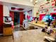 Eat-in kitchen featuring bright counters, white cabinets, and cheerful window coverings at 46 Carriage Hill Cir, Casselberry, FL 32707