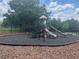 Community playground with slides and climbing equipment, perfect for outdoor fun at 477 Madison Dr, Davenport, FL 33837