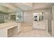 Bright bathroom with a vanity, soaking tub, separate shower, and tile flooring at 492 Lanarkshire Pl, Apopka, FL 32712