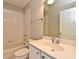 Bright bathroom featuring a tub-shower combo and vanity with a white countertop and cabinets at 492 Lanarkshire Pl, Apopka, FL 32712