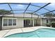 Large screened-in pool area with ample patio space, ideal for outdoor entertaining, adjoins the house at 492 Lanarkshire Pl, Apopka, FL 32712