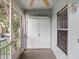 A screened porch with a ceiling fan and an exterior storage closet is great for outdoor enjoyment at 507 Northlake Dr # 507, Sanford, FL 32773