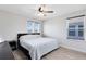 Sunlit bedroom with wood floors, and neutral color scheme at 5677 Cedar Chase Dr, St Cloud, FL 34771
