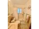 Bathroom featuring a shower with grab bars, and neutral-toned fixtures at 578 3Rd St, Daytona Beach, FL 32117