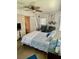 Cozy bedroom featuring a ceiling fan, and decor for a tranquil retreat at 578 3Rd St, Daytona Beach, FL 32117
