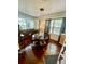 Elegant dining room with hardwood floors, natural light, and a modern light fixture at 578 3Rd St, Daytona Beach, FL 32117