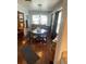 Open dining area with hardwood floors and window at 578 3Rd St, Daytona Beach, FL 32117