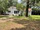 Charming single-story home with a well-manicured lawn and a welcoming front entrance at 578 3Rd St, Daytona Beach, FL 32117