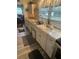 Bright and inviting kitchen with granite countertops, modern appliances, and ample cabinet space at 578 3Rd St, Daytona Beach, FL 32117