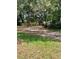 Image of land with mature trees and green grass at 578 3Rd St, Daytona Beach, FL 32117