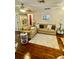 Comfortable living room with hardwood floors, cozy seating, and ample natural light at 578 3Rd St, Daytona Beach, FL 32117