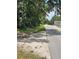 View of a tree-lined street showing the property at 578 3Rd St, Daytona Beach, FL 32117