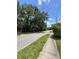 Street view of a residential area with mature trees and sidewalks at 578 3Rd St, Daytona Beach, FL 32117