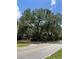 Street view showing a large mature oak tree at 578 3Rd St, Daytona Beach, FL 32117