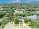 Aerial view of home showcasing property lines, landscaping, and neighborhood at 624 Richmond Street, Orlando, FL 32806