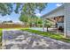 View of backyard, patio, pool, bocce court and fence at 624 Richmond Street, Orlando, FL 32806